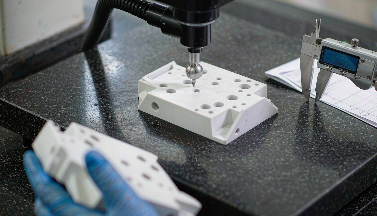 First article inspection of a molded plastic part on a granite surface plate