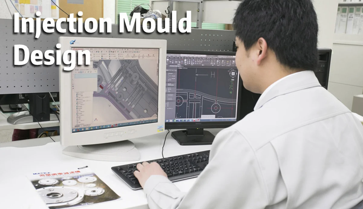 Mold design engineer reviewing injection mold CAD drawings during a DFM review