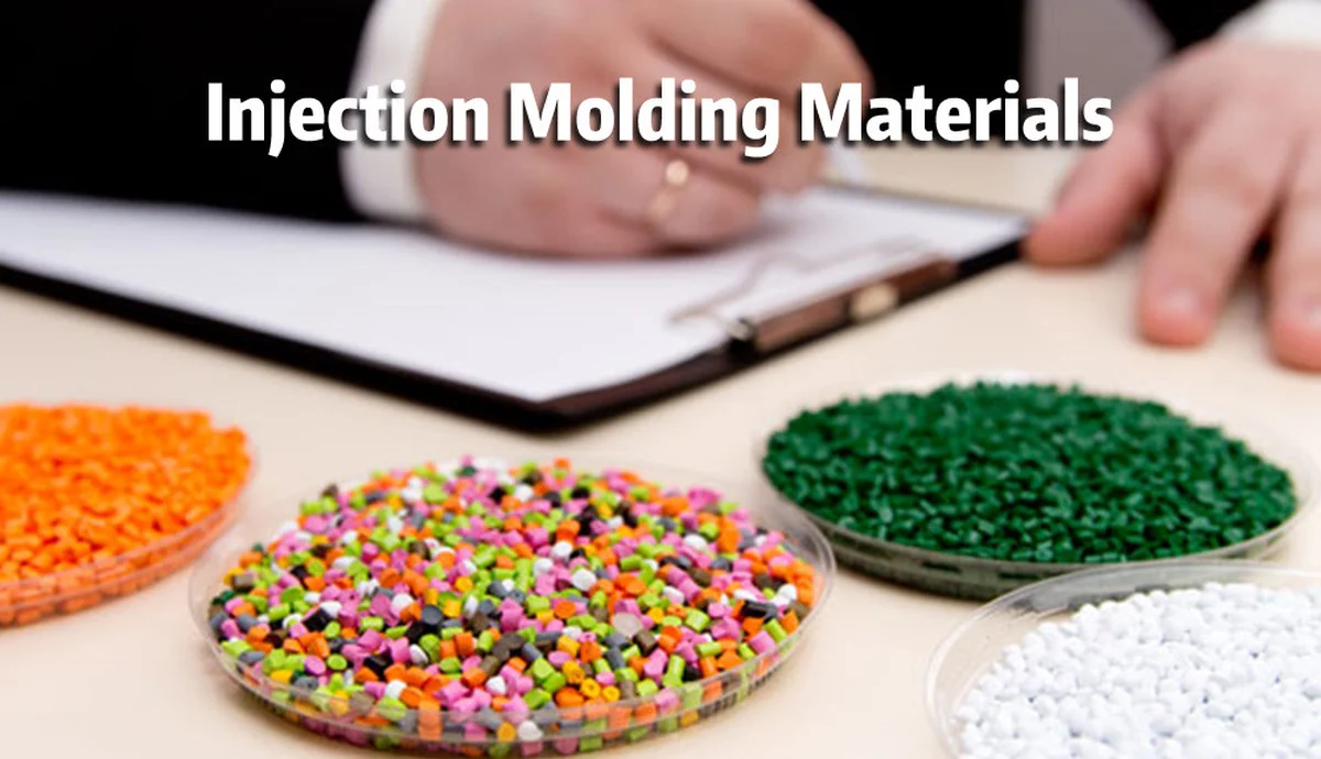 Plastic resin pellets in different colors being selected for injection molding